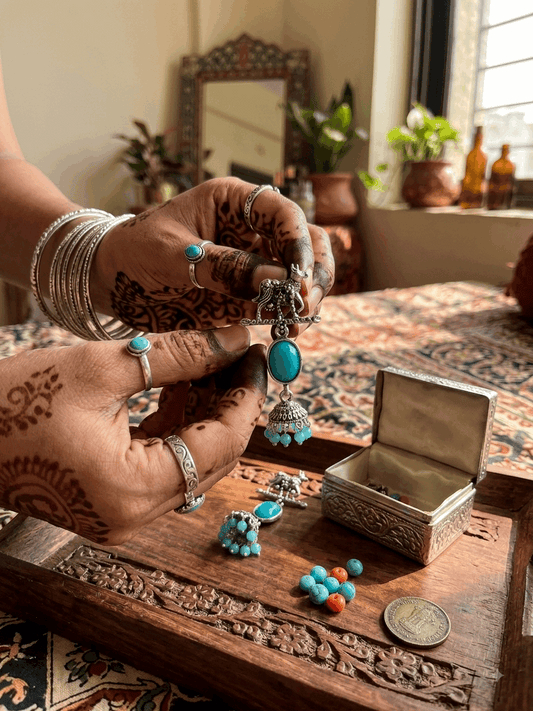 Oxidised Silver Cow Motif Sky Blue Oval Stone Jhumka Earrings for Women