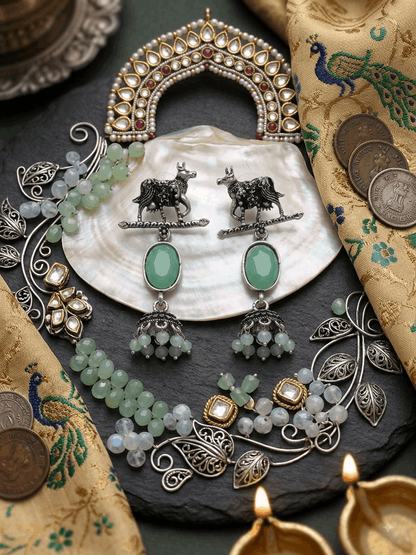 Oxidised Silver Cow Motif Turquoise Oval Stone Jhumka Earrings for Women
